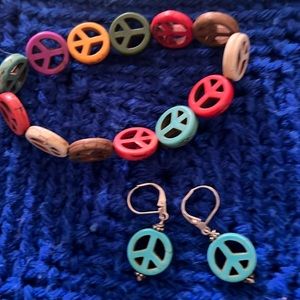 Turquoise blue peace sign earrings with matching elasticized bracelet